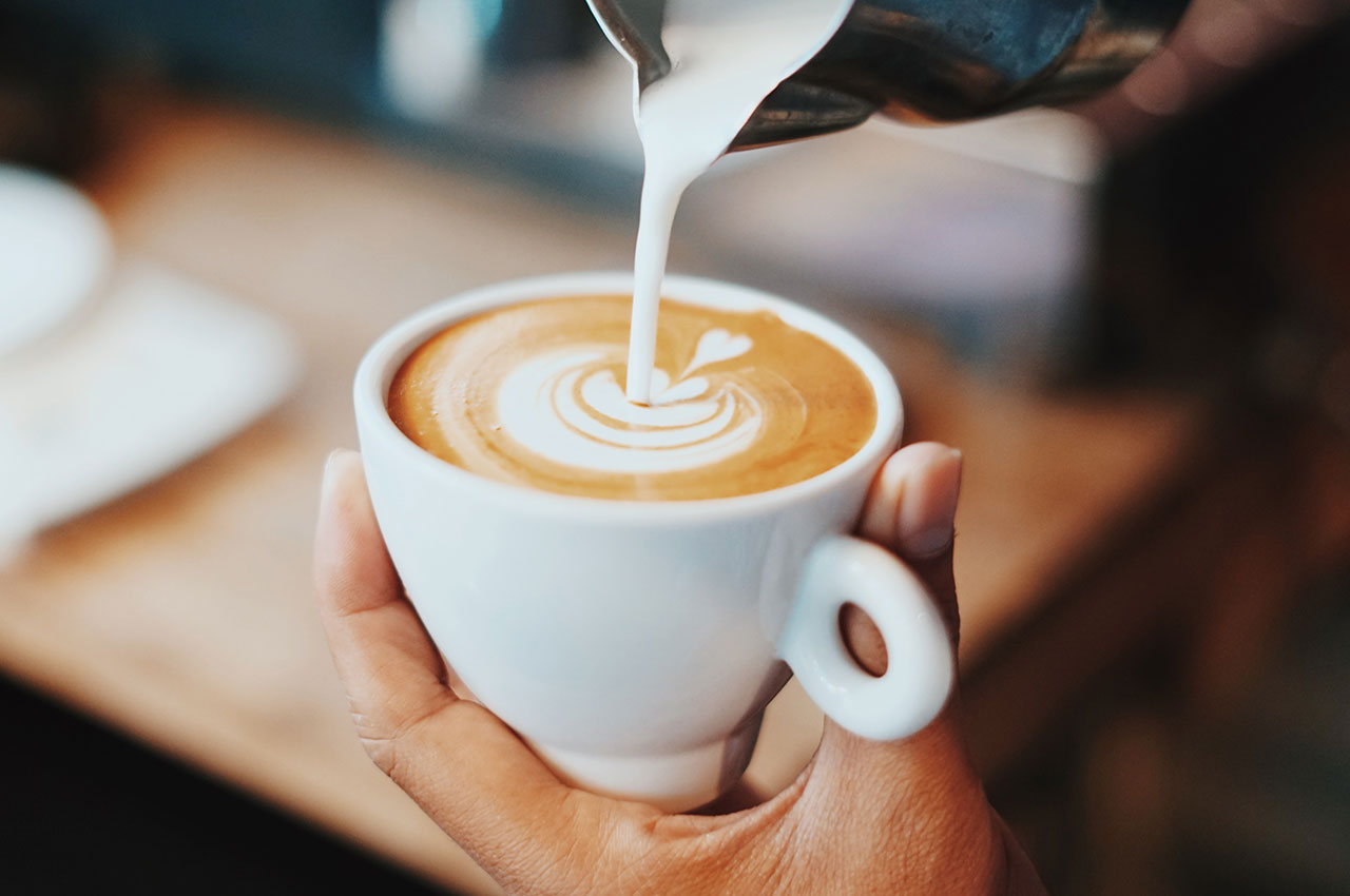 Pouring MilkIn Coffee