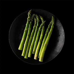 Green asparagus on plate Green asparagus on plate